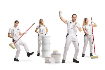 Team of house painters dancing and singing in a music band