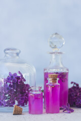 Obraz na płótnie Canvas Lilac essence vials