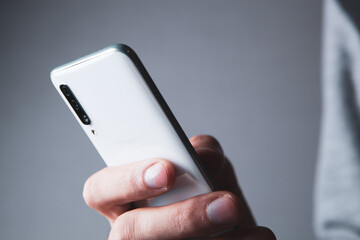 a man holding a phone in his hands