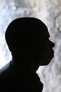Silhouette of an African man in backlighting. 