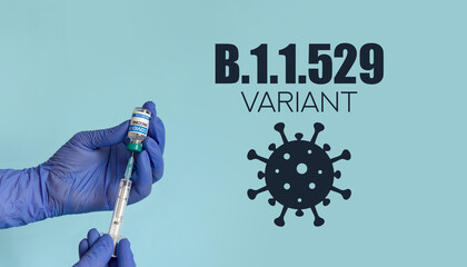 Close-up of hands holding syringe and covid vaccine vial on white background with B.1.1.529