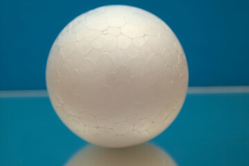 Polystyrene ball with its bubbly texture visible