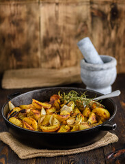 baked potatoes with onions and herbs