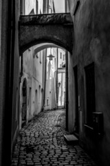 Fototapeta na wymiar Narrow little alley in the center of Passau in Bavaria