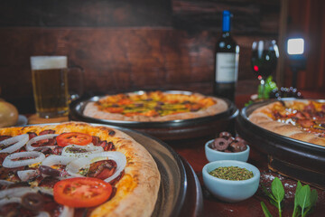 Bacon pizza, tomato, olive, oil, mozzarella, pepperoni