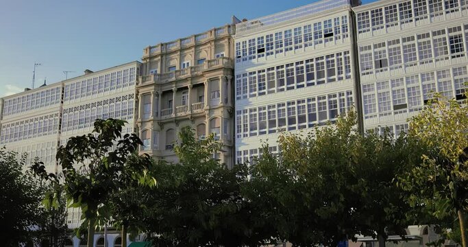 Glass facades of old houses. Spain, Europe.