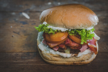 hamburger, lettuce, tomato, bacon, egg