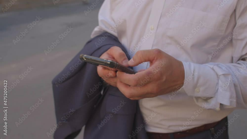 Poster close-up of male hands with the phone. using technology to make life easier. application with naviga
