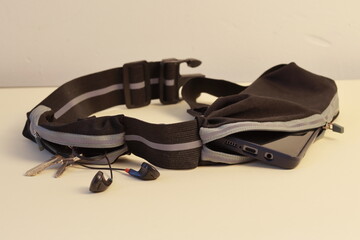 Sports belt for running with phone, headphones and keys