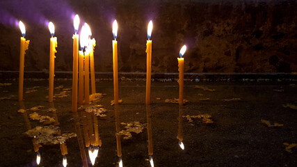burning candles in church