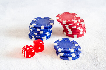 Red dices and gambling chips for poker. Casino games background