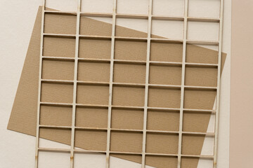 wooden grid with paper