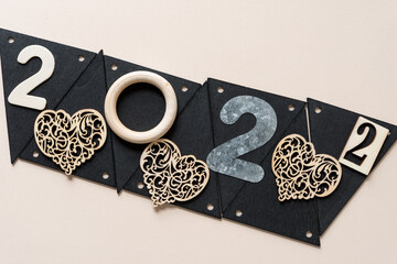 the number 2022 with hearts on banner tags and paper