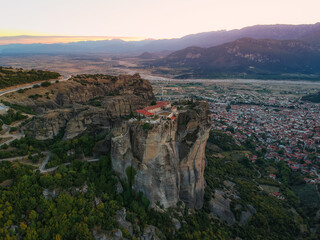 Fototapeta na wymiar Aerial view over Meteora, a rock formation in central Greece hosting one of the largest most precipitously built complexes of Eastern Orthodox monasteries. Kalampaka, Greece, Europe