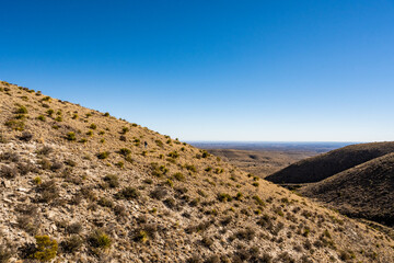 Hiker Rounds the Corner Of El Capitan Trail In Guadalupe Mountains