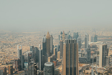 View to skyscrapers and urban architecture of Dubai downtown and Financial Center area from a high building