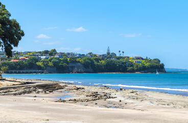 Fototapeta na wymiar Landscape View of Mairangi Bay Beach Auckland, New Zealand; Place for Picnic and Relaxing