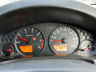 Car interior dashboard details. Speedometer display.