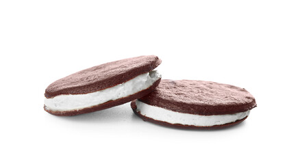 Tasty chocolate cookies with cream on white background