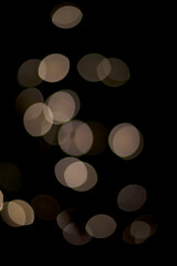 Warm bokeh lights with a dark background