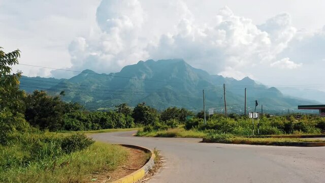 Driving On The Road In Tanzania With View Of Uluguru Mountains In Background. POV