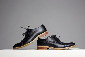 Trendy men's shoes.fashion still life. men black boots