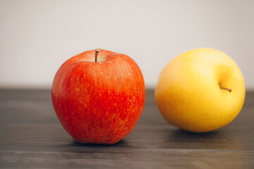 Fruit apples in a row on the table
