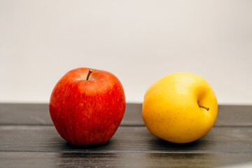 Fruit apples in a row on the table