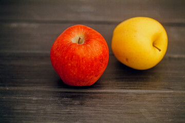 Fruit apples in a row on the table