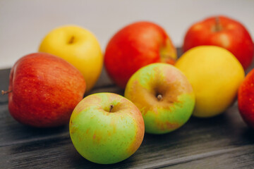 Beautiful multi-colored apples on the table