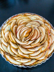 Close up from side of freshly baked Apple Pie served on a plate