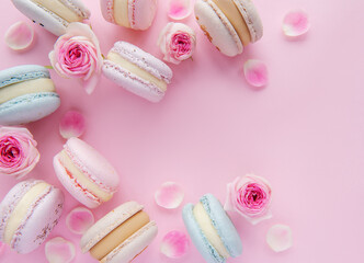 Tasty macaroons with beautiful roses