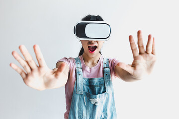 Young latin woman with glasses of virtual reality on a white background. Future technology concept. Modern imaging technology in Latin America