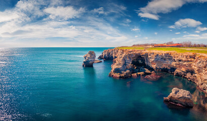 Adorable spring view of popular tourist destination - Tyulenovo cliffs. Calm morning seascape of Black sea. Captivating outdoor scene of Bulgaria, Europe. Traveling concept background.