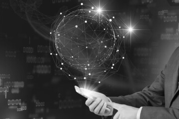 hand holding a globe