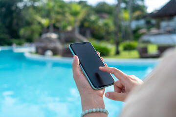Woman hand using smartphone to do work business, social network, communication.