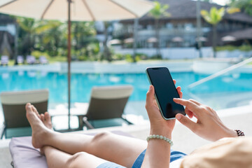 Woman hand using smartphone to do work business, social network, communication.