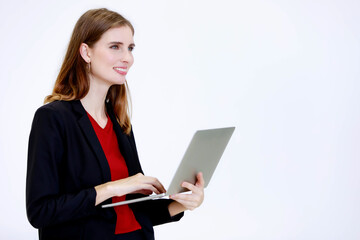 Studio shot of millennial Caucasian stressed depressed irritated doubtful moody female employee secretary businesswoman standing holding laptop computer thinking solving problem on white background