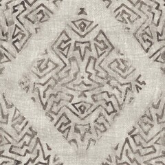 Seamless tan brown grungy tribal neutral rug motif surface pattern design for print. High quality illustration. Distressed bohemian ethnic repeat swatch. Hand drawn diamond damask textile design.