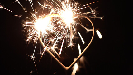 igniting heart shaped sparkler