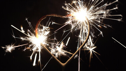 igniting heart shaped sparkler