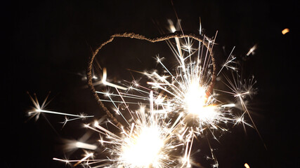 igniting heart shaped sparkler