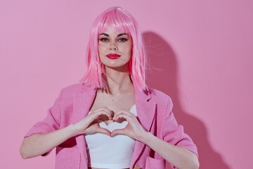 Positive young woman bright makeup pink hair glamor Studio Model