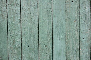 Old dry rural wooden wall with a many vertical gray boards vintage background texture