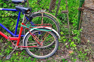 Fototapeta na wymiar Vintage bike in a street.old bike at an old town