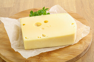 Maasdam cheese over the board