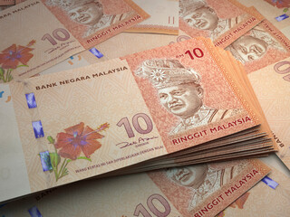 Malaysian money. Malaysian ringgit banknotes. 10 MYR ringgits bills.