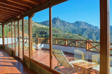 Large windows,  summer terrace , mountain landscape view.