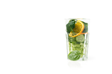 Detox cleanse drink concept. A glass half colorful ingredients that go into the smoothie. 