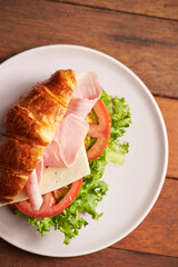 ham and cheese sandwich on plate